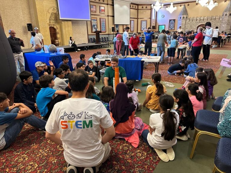 Learning Through Discovery: Students explore rockets and space exploration with a NASA-related presenter.