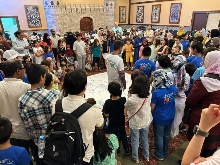 Inspiring Our Community: Families and students gather for a hands-on robotics challenge.